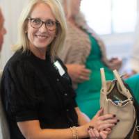 faculty discussing at table